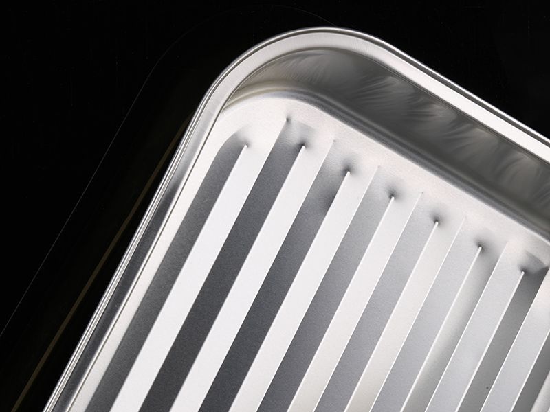 Ridged base trays